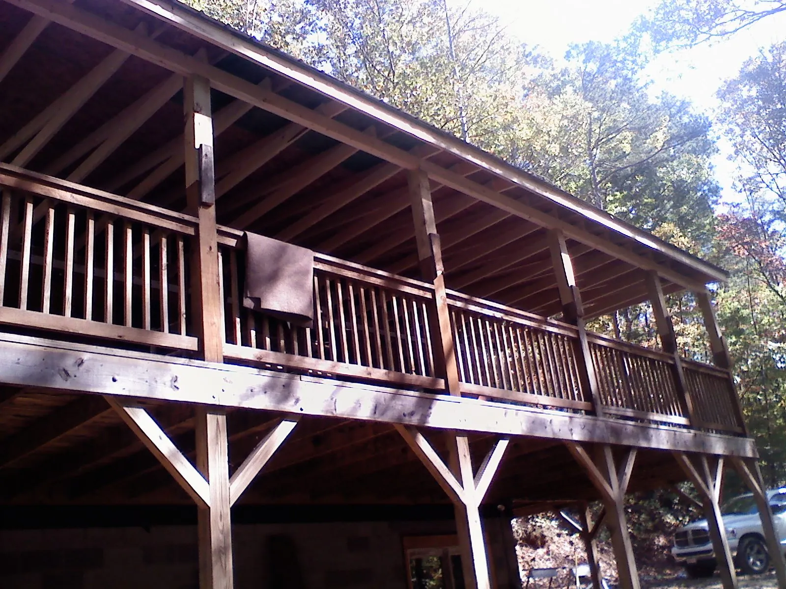 Timber framing under a new elevated porch and deck — Roof Leak Repair in Locke by Roofing Brothers